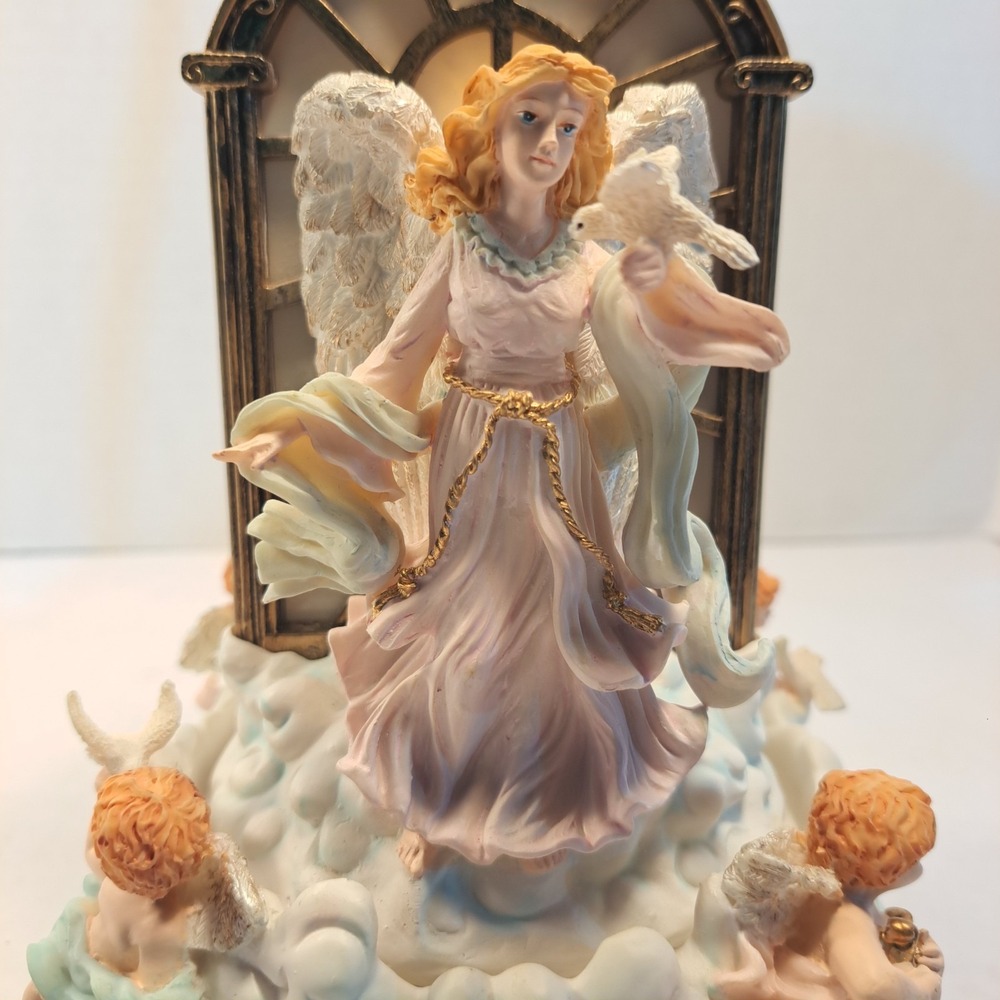 1999 Avon Ceramic Divine Angel & Dove w/Rotating Cherubs & Lighted Music Box